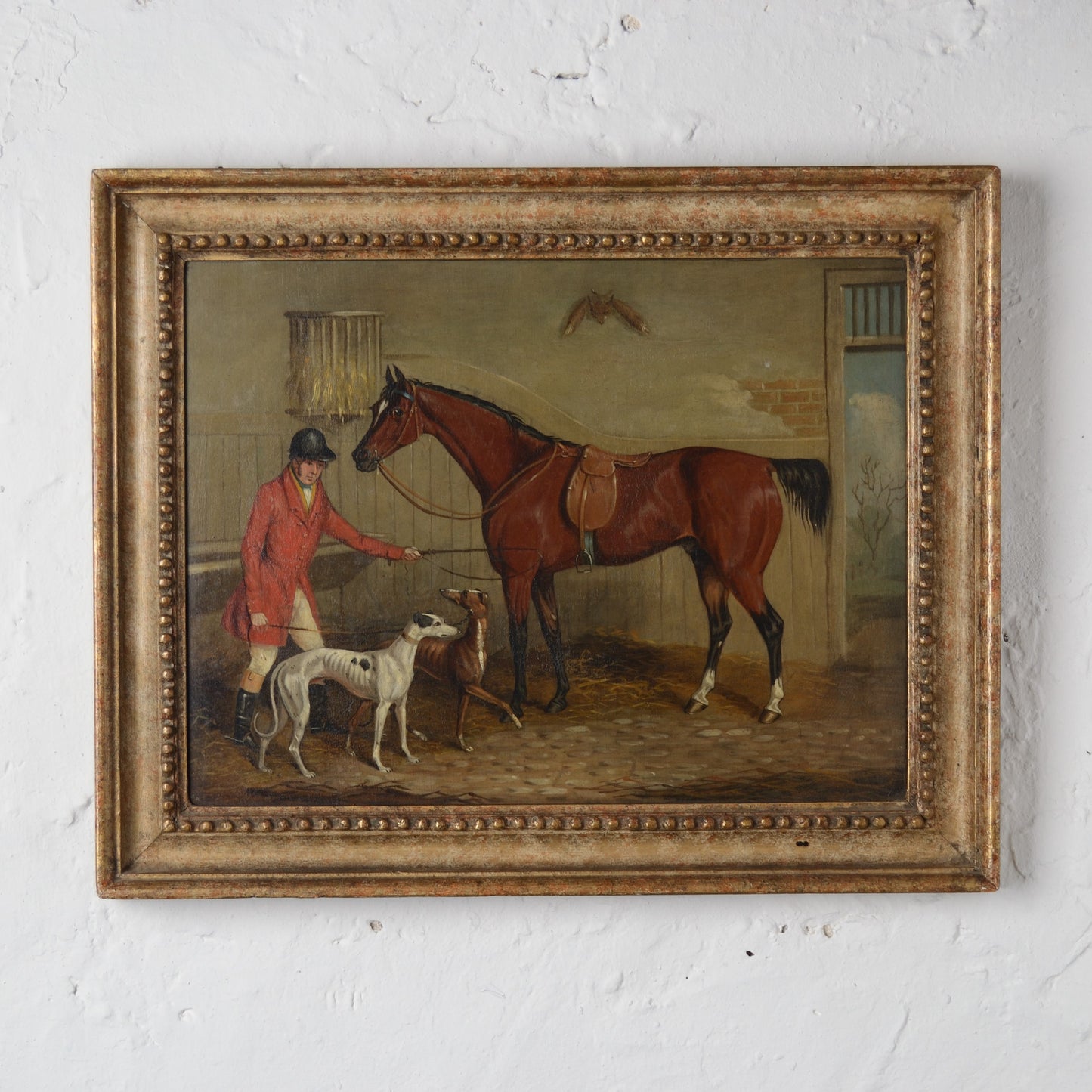 Huntsman with his dogs and horse in a stable  Oil on Canvas 19th Century