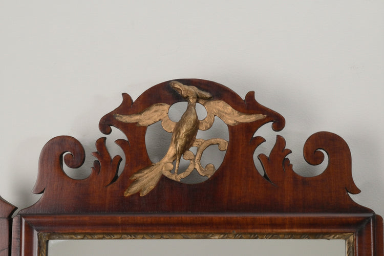A Georgian Mahogany and Parcel Gilt Fretwork Wall mirror