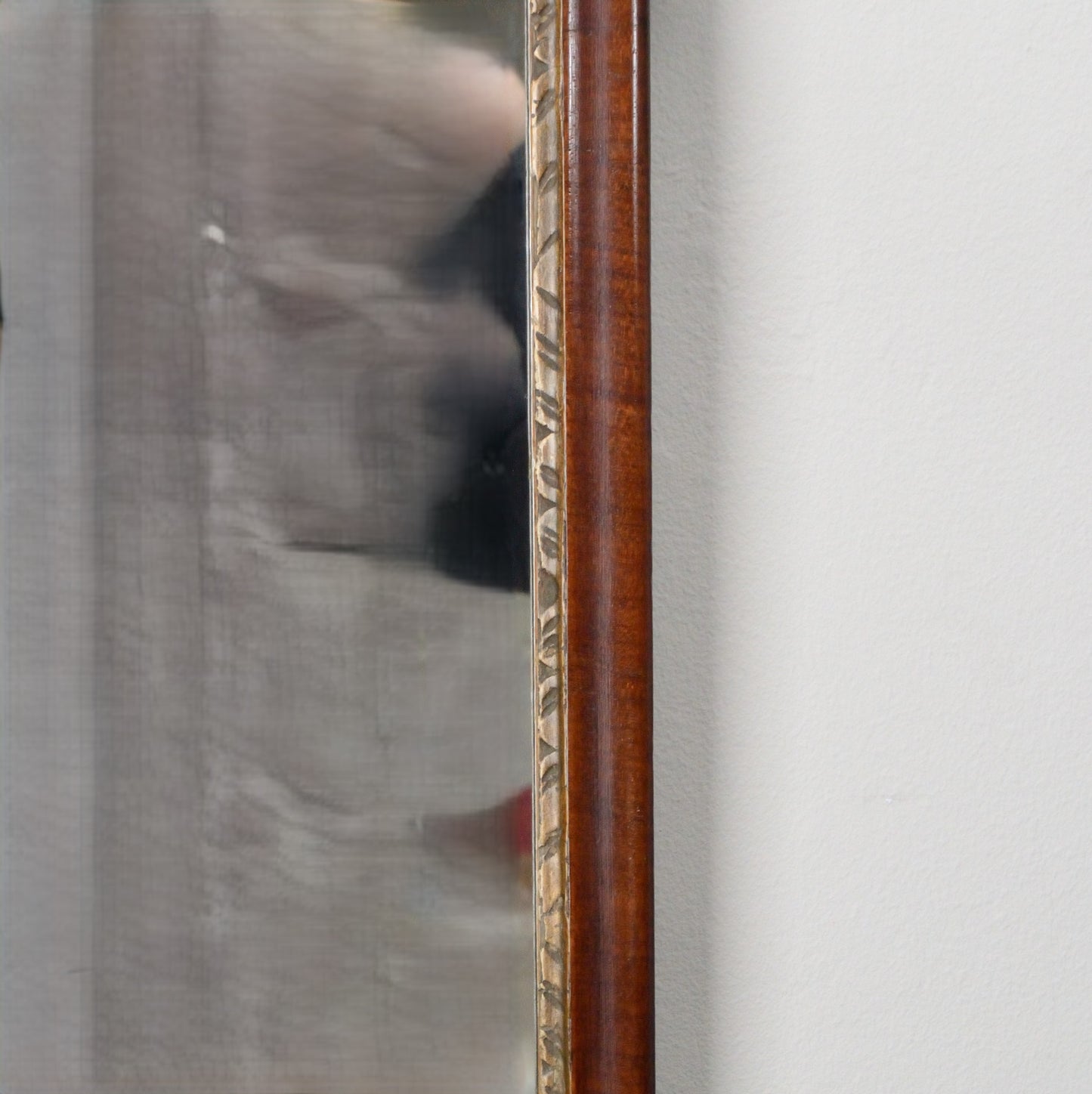 A Georgian Mahogany and Parcel Gilt Fretwork Wall mirror