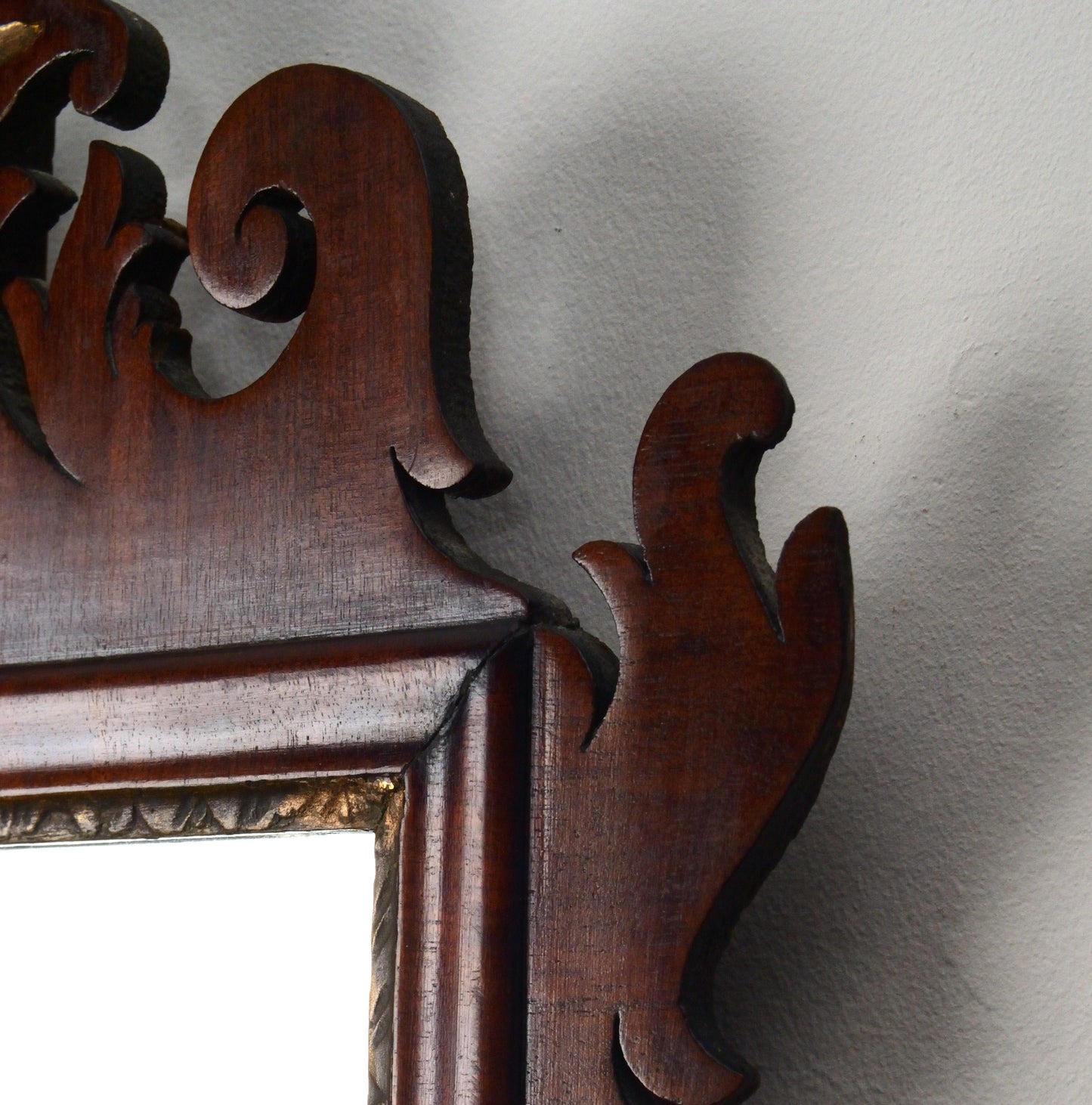 A Georgian Mahogany and Parcel Gilt Fretwork Wall mirror