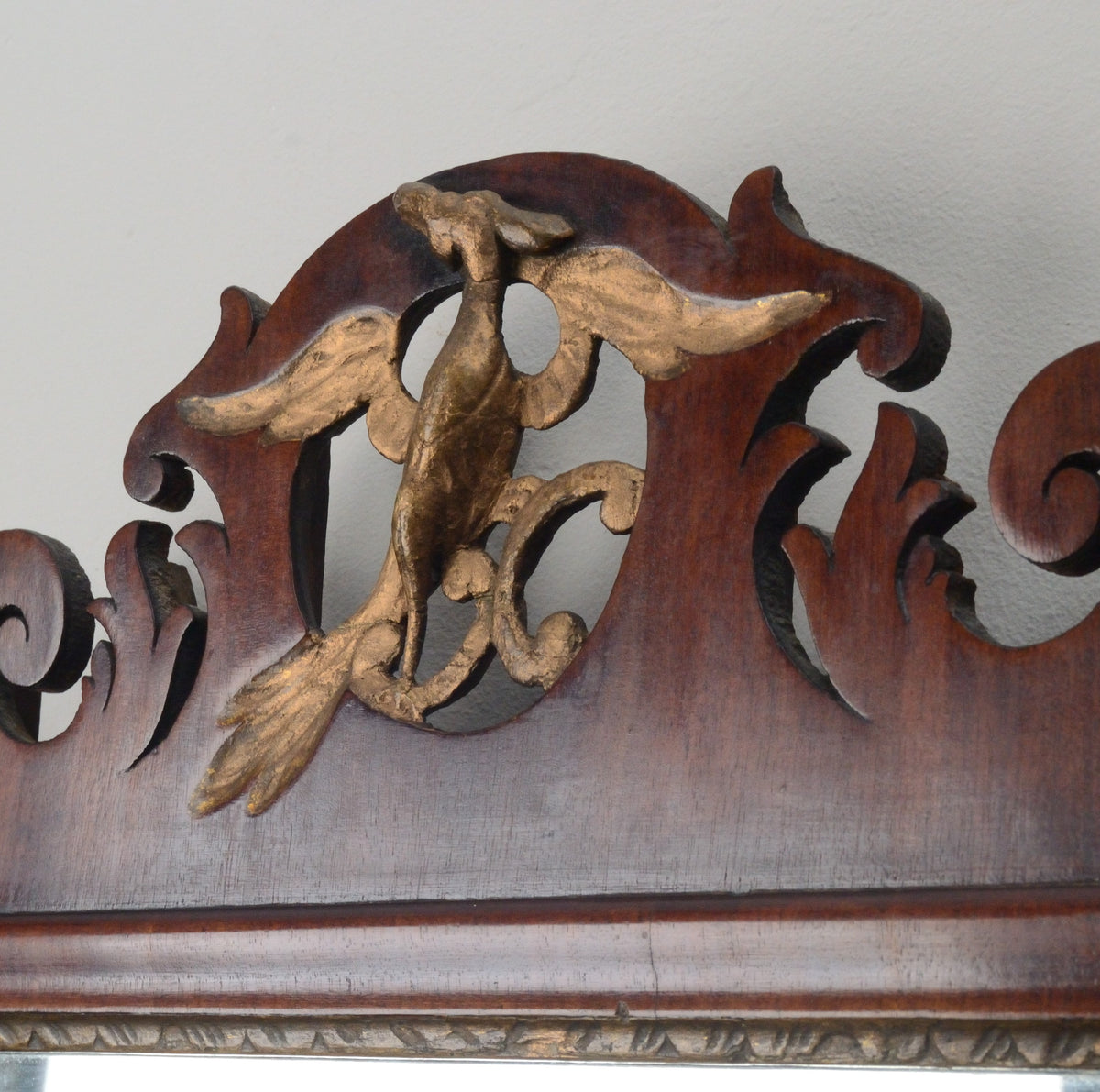 A Georgian Mahogany and Parcel Gilt Fretwork Wall mirror
