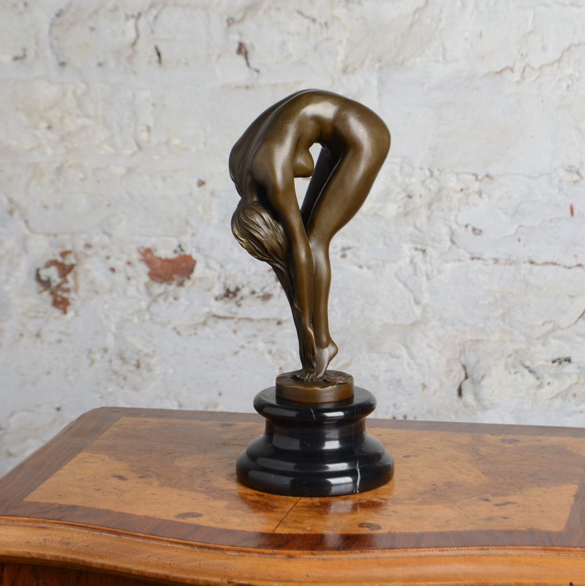 A Bronze Sculpture of a Female Nude Figure