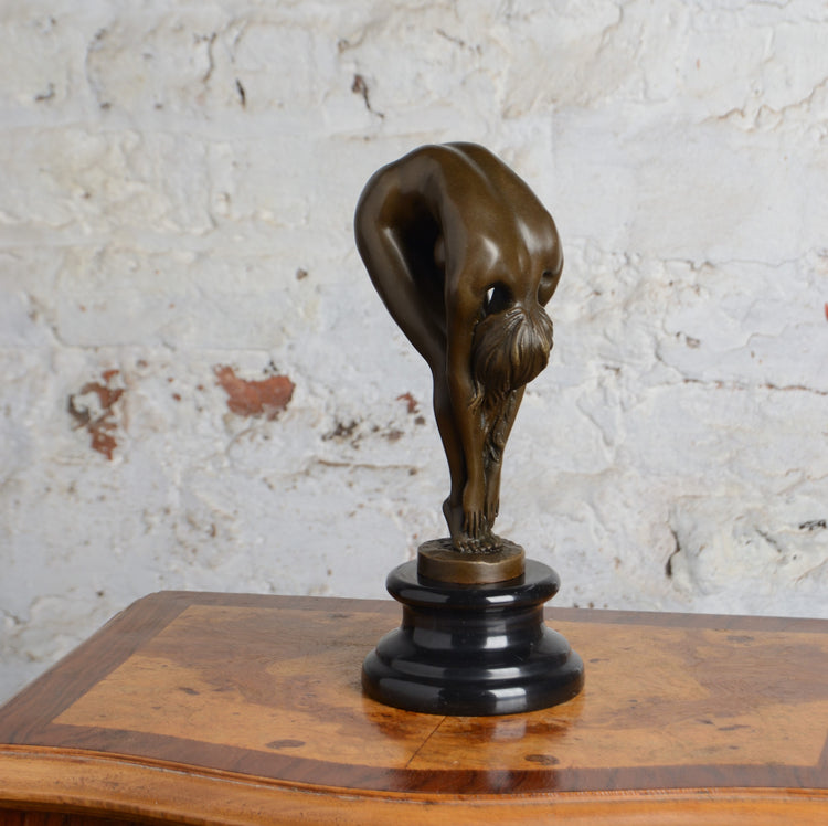 A Bronze Sculpture of a Female Nude Figure