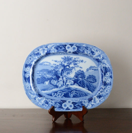 A Piping Shepherd Pattern Blue and White Serving Dish