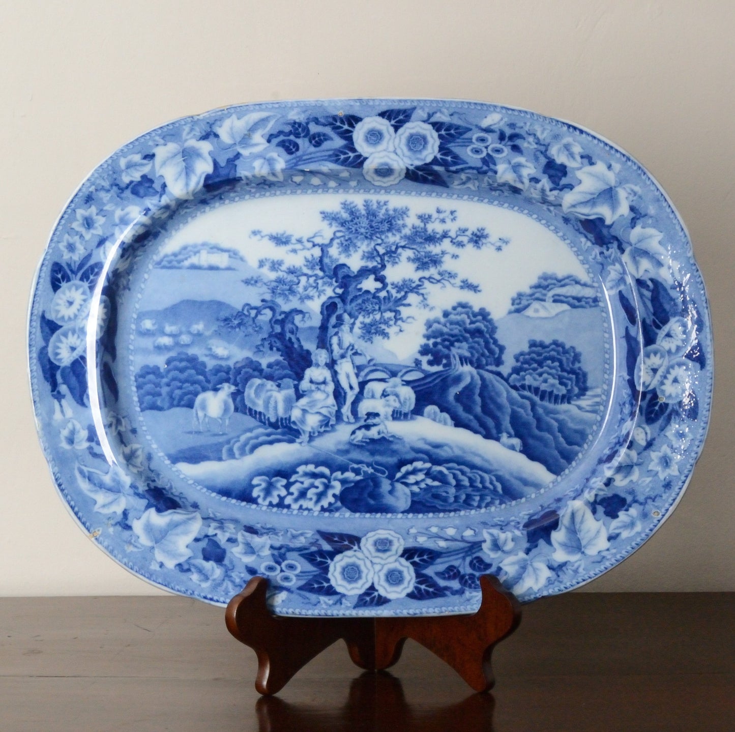 A Piping Shepherd Pattern Blue and White Serving Dish