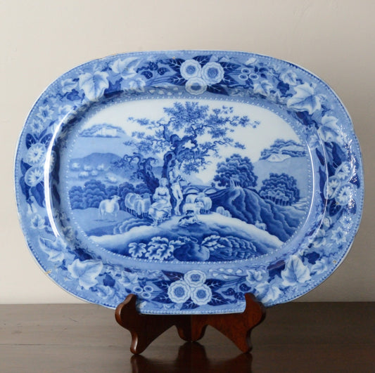 A Piping Shepherd Pattern Blue and White Serving Dish