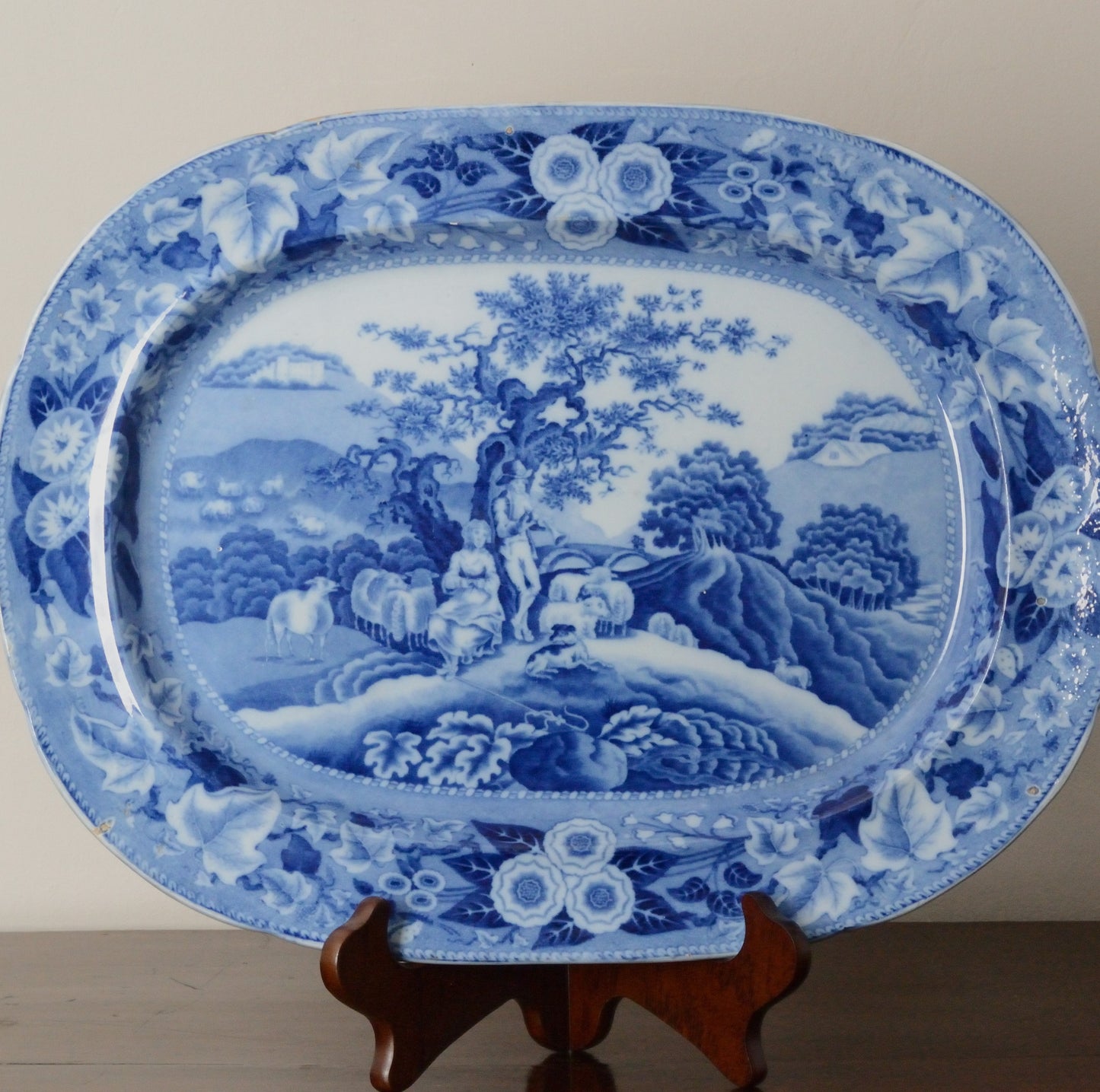 A Piping Shepherd Pattern Blue and White Serving Dish