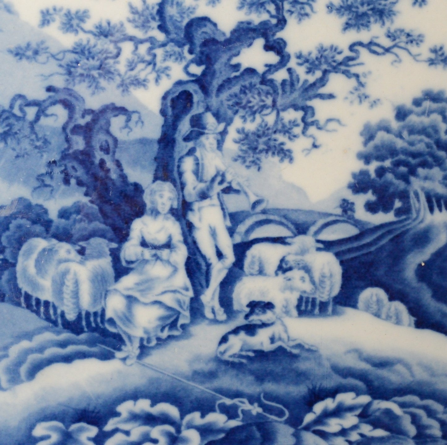 A Piping Shepherd Pattern Blue and White Serving Dish