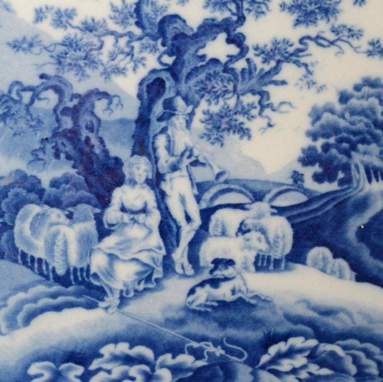A Piping Shepherd Pattern Blue and White Serving Dish