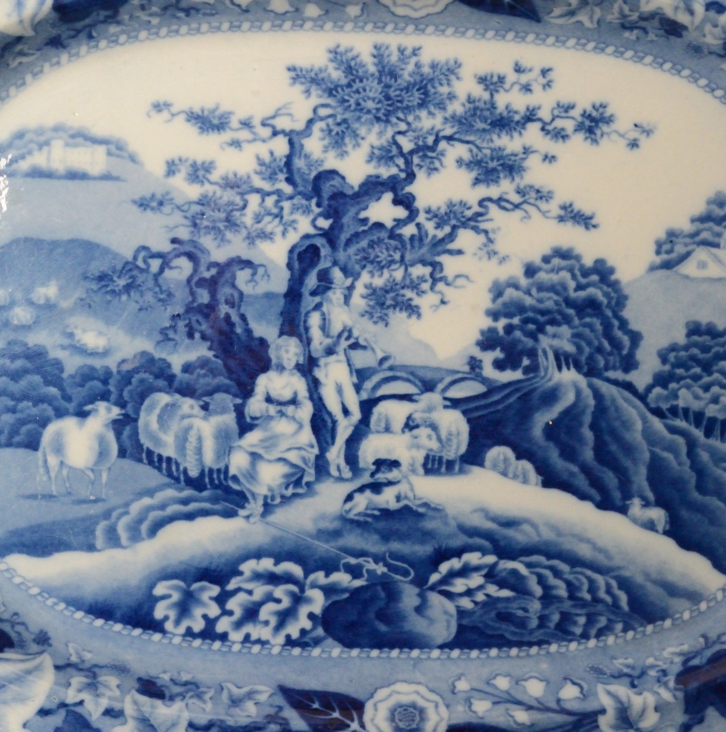 A Piping Shepherd Pattern Blue and White Serving Dish