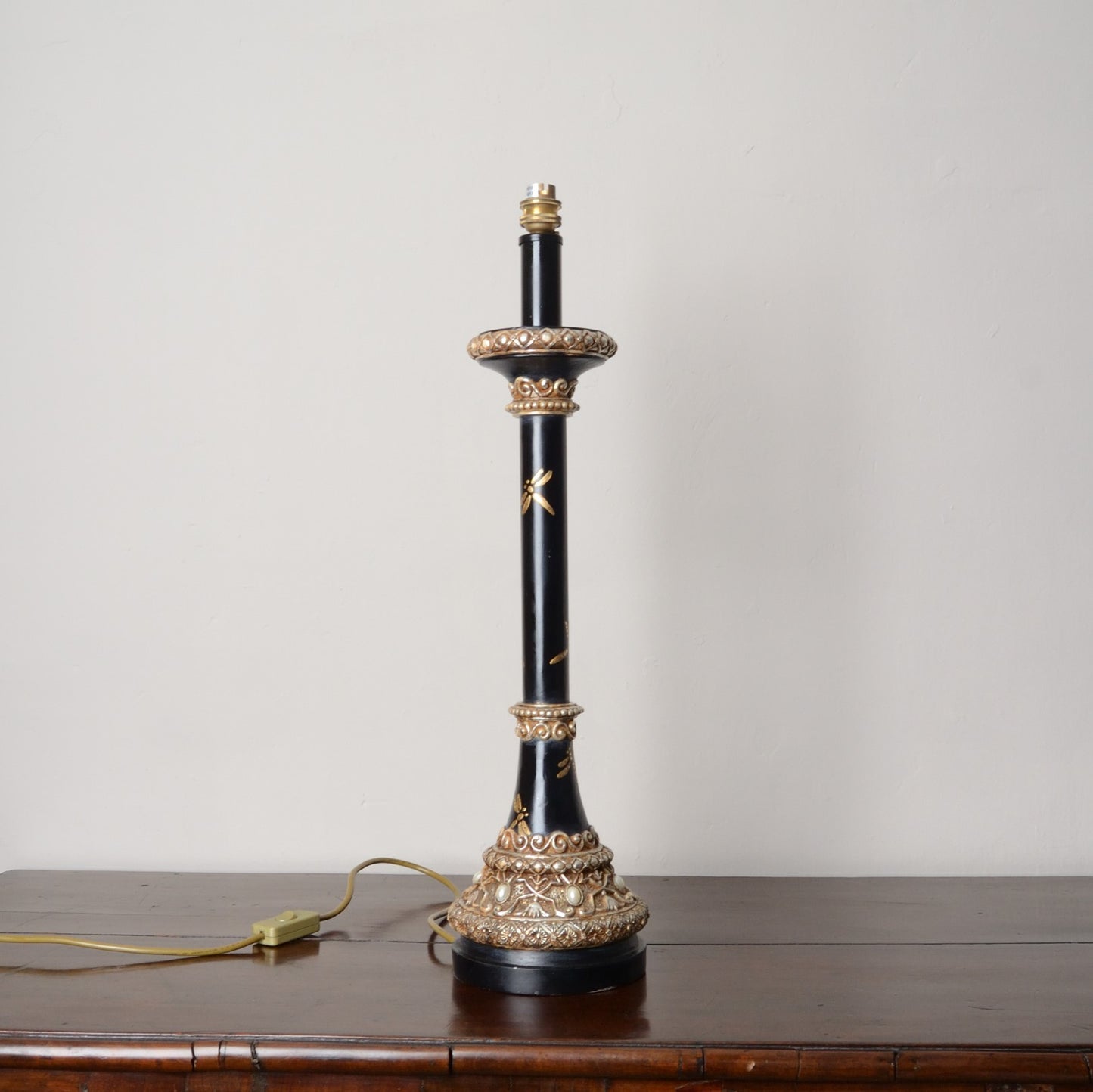 A Pair of Black Japanned and Hand Painted Table Lamps