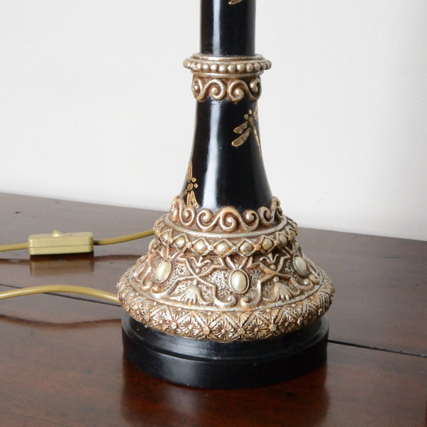 A Pair of Black Japanned and Hand Painted Table Lamps