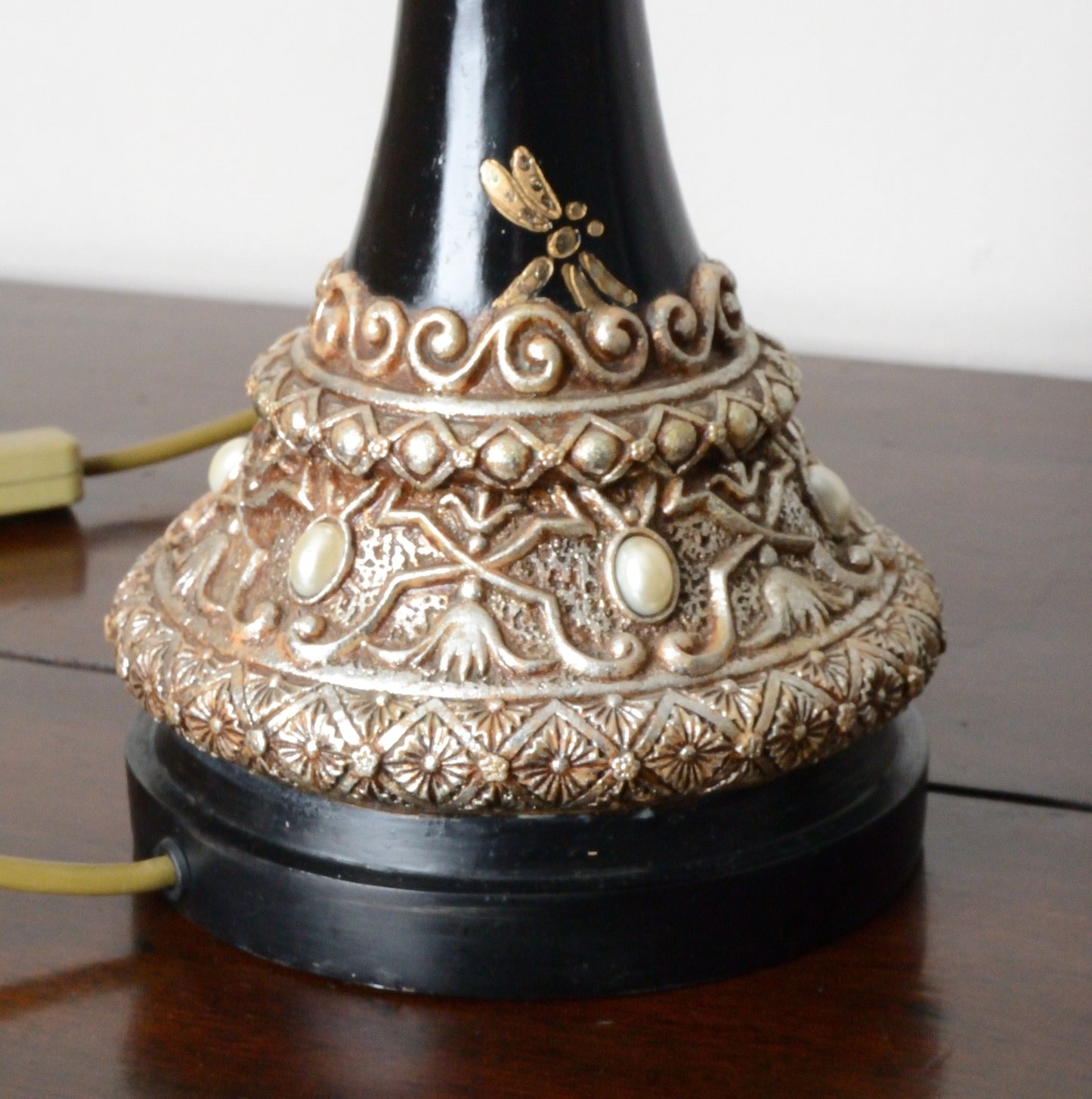 A Pair of Black Japanned and Hand Painted Table Lamps