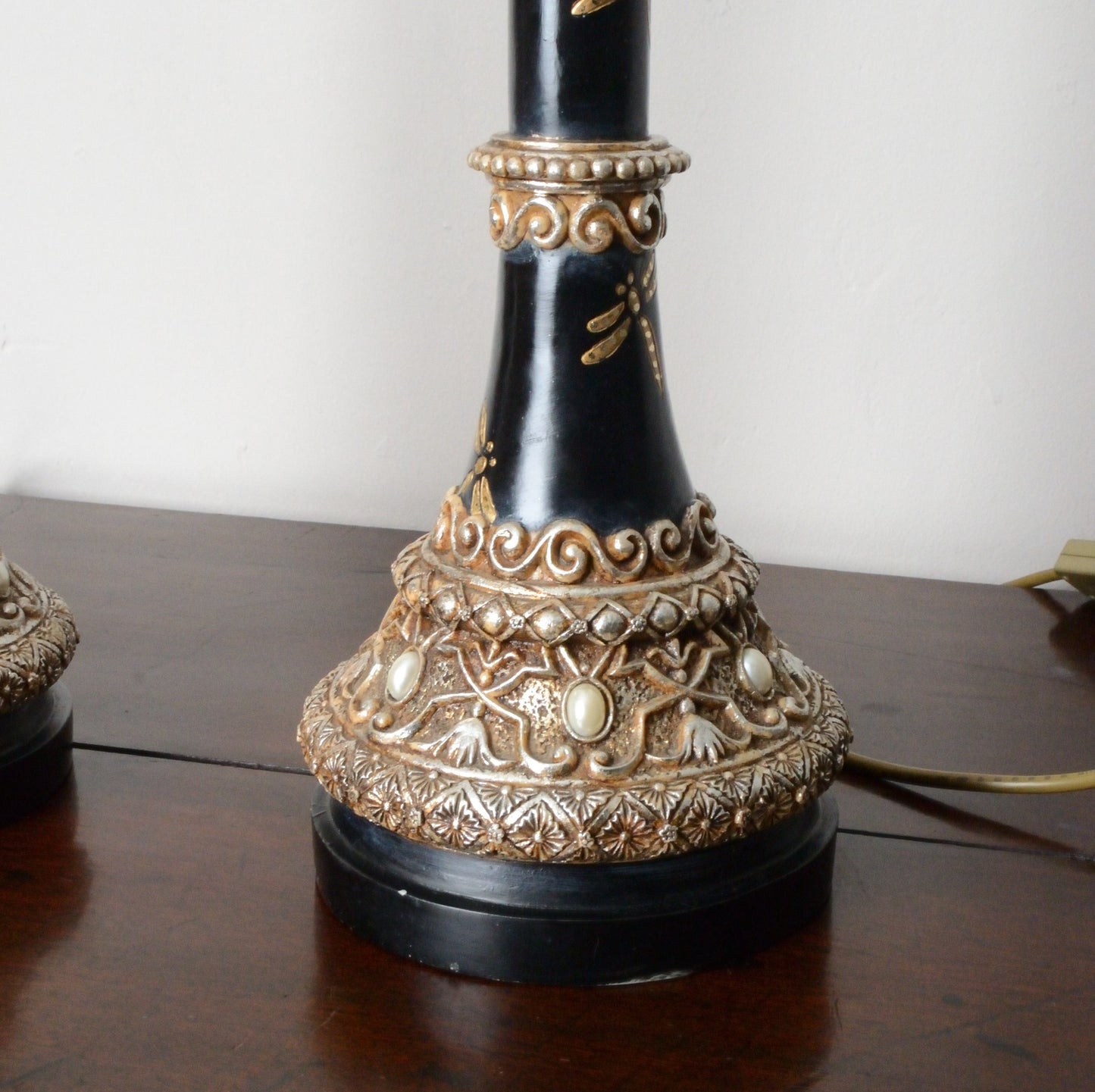 A Pair of Black Japanned and Hand Painted Table Lamps