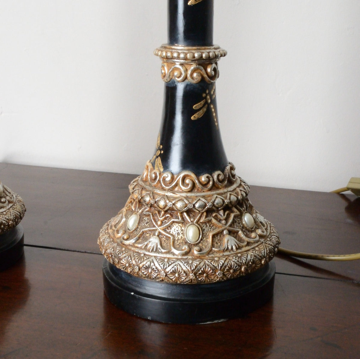 A Pair of Black Japanned and Hand Painted Table Lamps