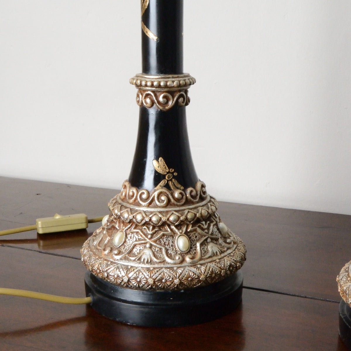 A Pair of Black Japanned and Hand Painted Table Lamps