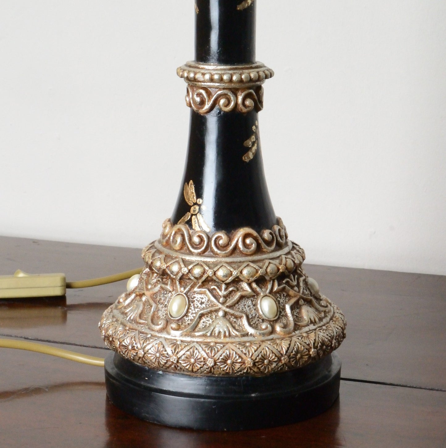 A Pair of Black Japanned and Hand Painted Table Lamps