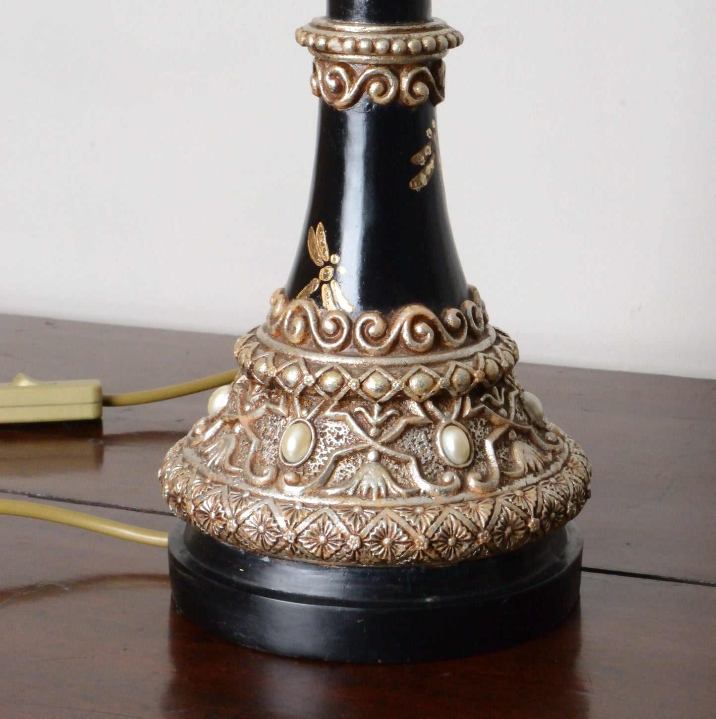 A Pair of Black Japanned and Hand Painted Table Lamps