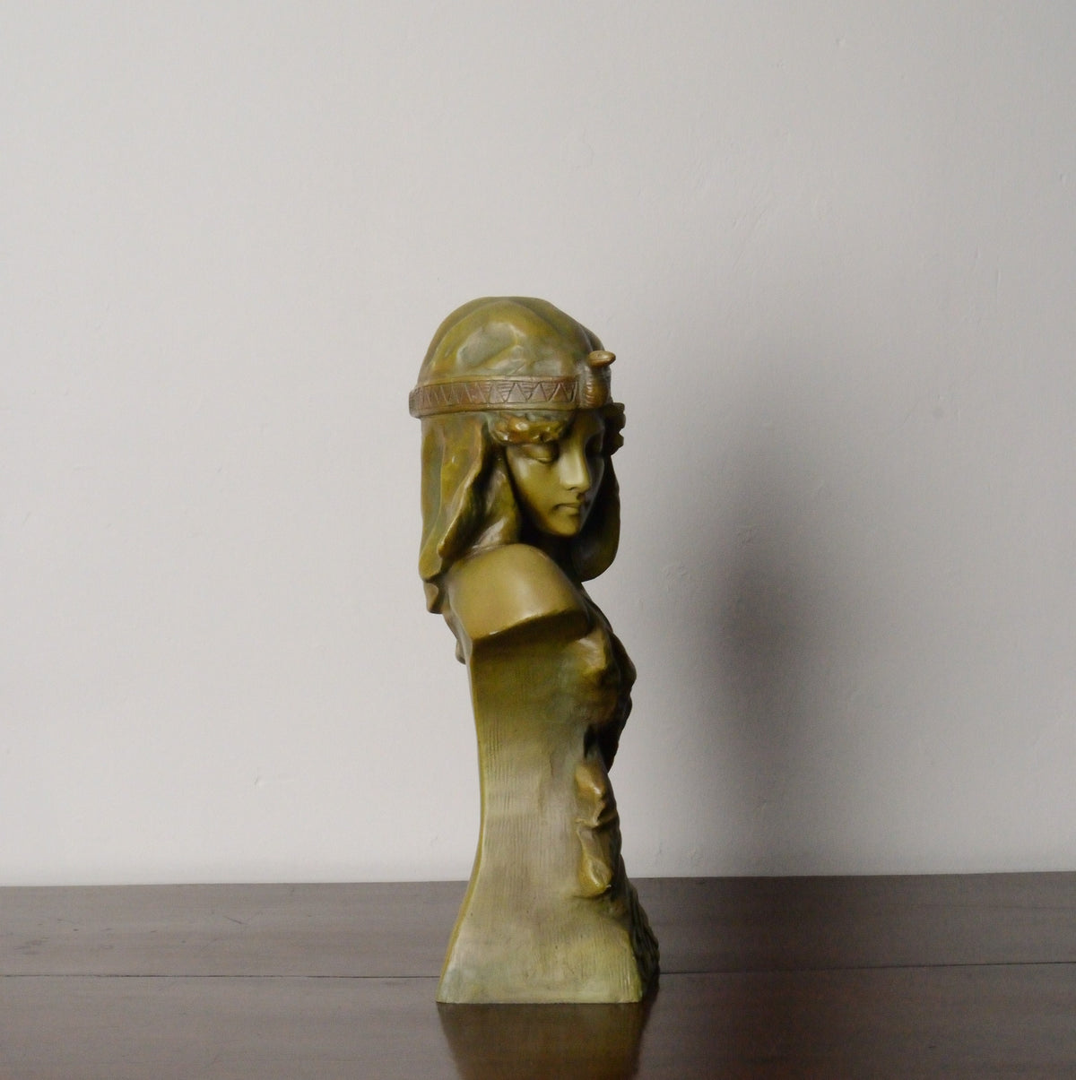 An Art Nouveau Bronzed Resin Bust