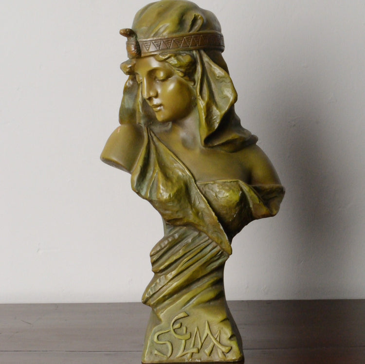 An Art Nouveau Bronzed Resin Bust
