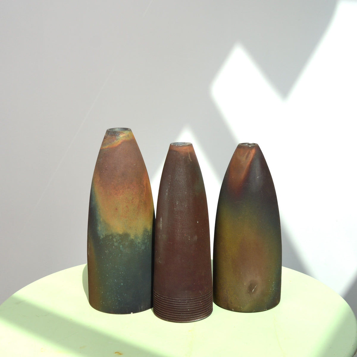 A Collection of Three Raku Conical Sculptures by Andrew Niblett