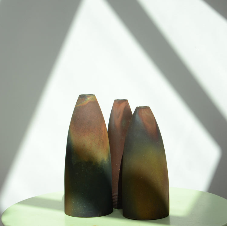 A Collection of Three Raku Conical Sculptures by Andrew Niblett
