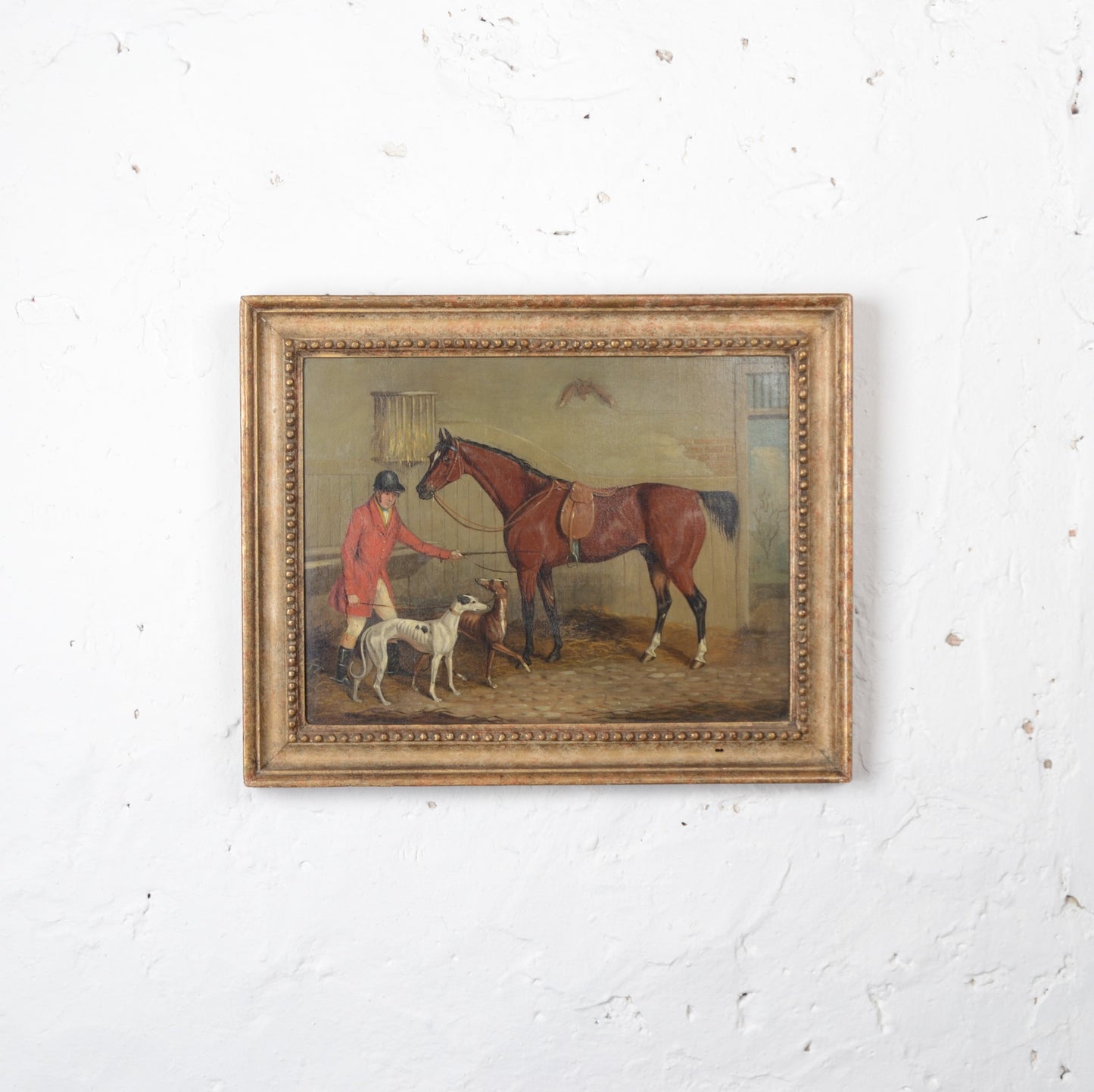 Huntsman with his dogs and horse in a stable  Oil on Canvas 19th Century