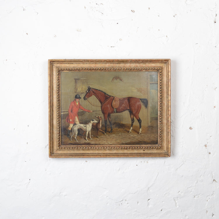 Huntsman with his dogs and horse in a stable  Oil on Canvas 19th Century